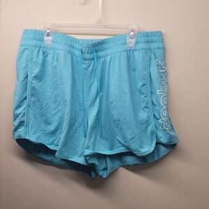 Womens medium Reebok athletic shorts in baby blue with pockets